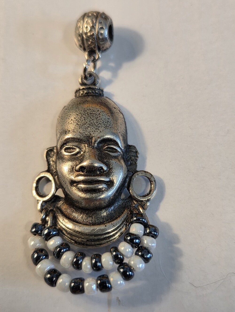 Silver-Tone Tribal Face Pendant Earrings with Black and Wwhite Stones